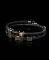 Odinė apyrankė su aukso detalėmis, pirštų antspaudais ir deimantu "Tėčiui"