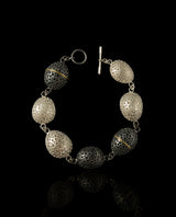 Sidabrinė apyrankė su auksu "Black and White"