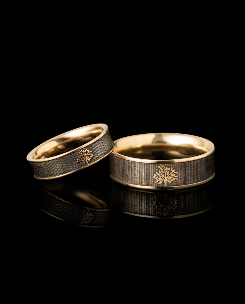 Raudono ir juodo aukso vestuviniai žiedai "Medžiai"