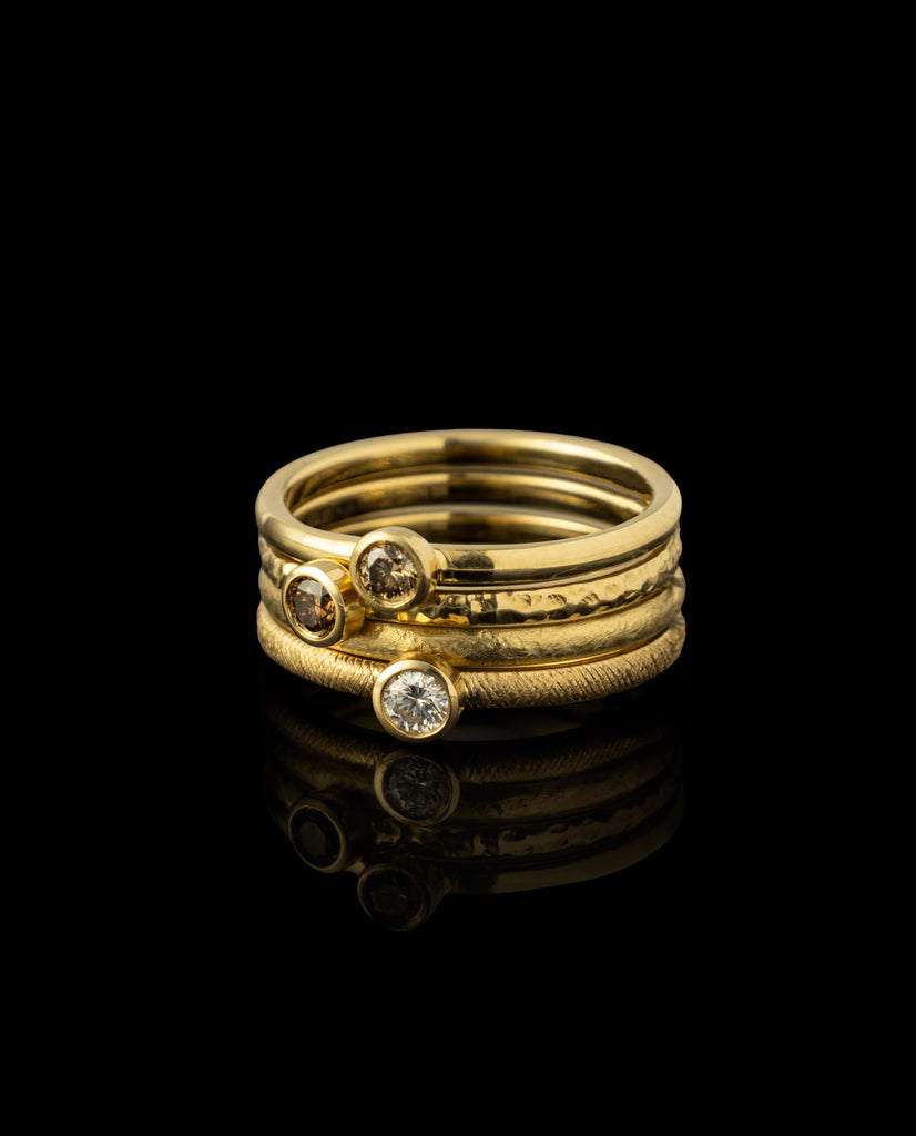Auksinių žiedų rinkinys su deimantais 